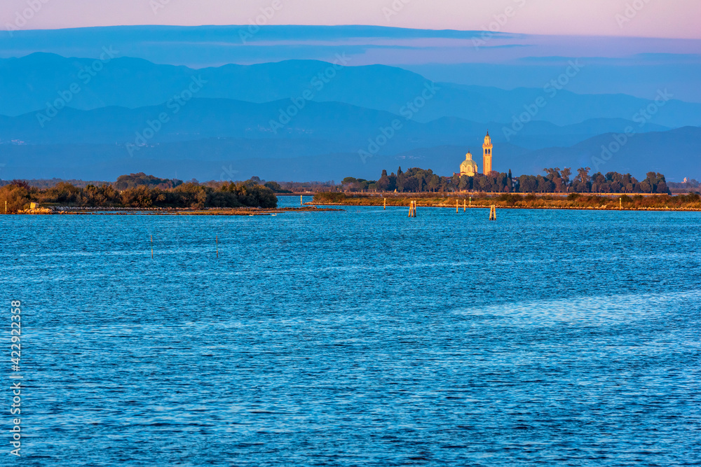 Grado and its lagoon at sunset. Glimpses of tranquility.