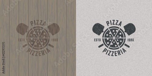 Colored illustration pizza, shovel, text on background with grunge and wood texture.Vector illustration in vintage style for emblem, poster, label, badge.Pizzeria.Pizza making and selling.