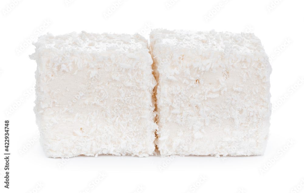 White Turkish delight with coconut shavings isolated on white White Turkish delight with coconut shavings isolated on white
