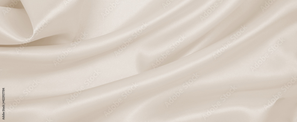 Smooth elegant golden silk or satin luxury cloth texture as wedding background. Luxurious background design. In Sepia toned. Retro style