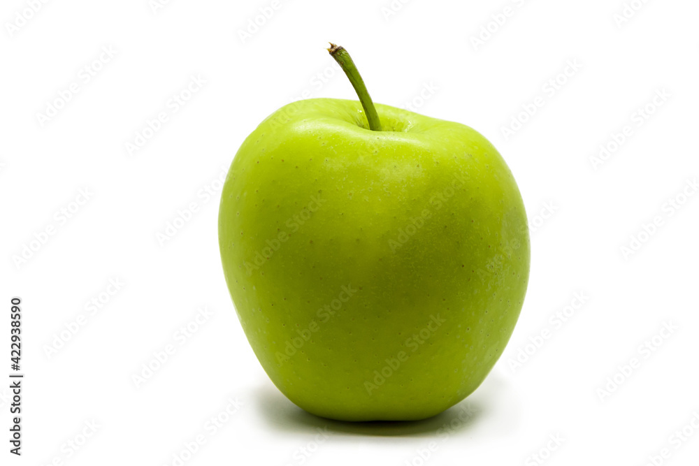 Green apple with a stalk on a white background, selective focus, close-up, isolate, space for your text.
