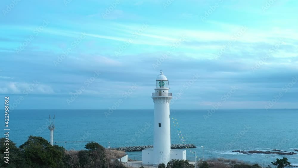 Rotating drone shot of a lighthouse by the ocean in Iwaki Japan. Rotating drone shot of a lighthouse by the ocean in Iwaki Japan.