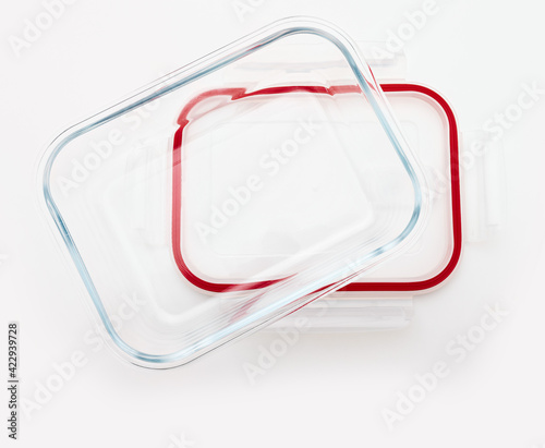 Empty and open glass tupperware. Top view. Isolated on white background.