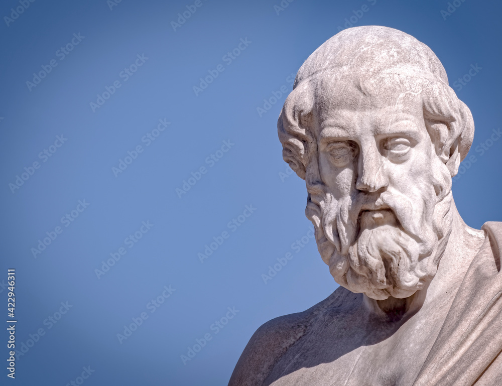 Plato, the ancient Greek philosopher white marble bust sculpture under blue sky background, space for your text.