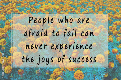 Motivational quote on blurred background of flowers - People who are afraid to fail can never experience the joys of success