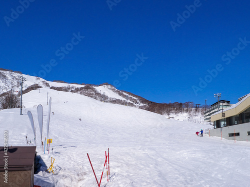 Quiet ski resort on a clear day in early spring (Niseko Mt.Resort Grand Hirafu, Hokkaido, Japan)