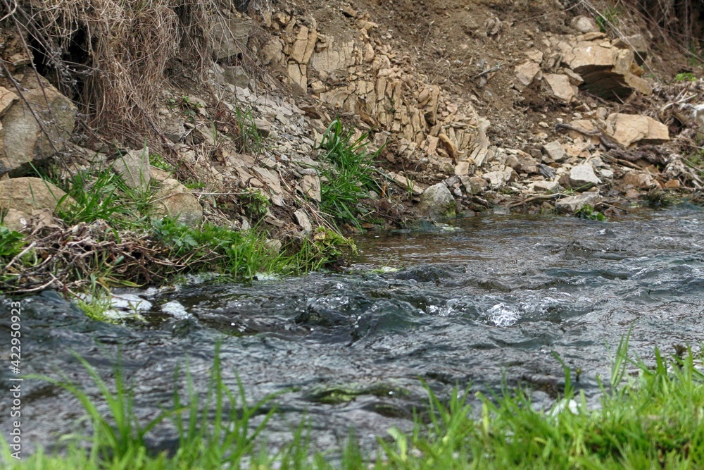 a small river in the mountains a small river in the mountains