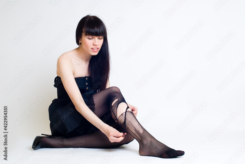Young attractive woman in torn stockings Young attractive woman in torn stockings