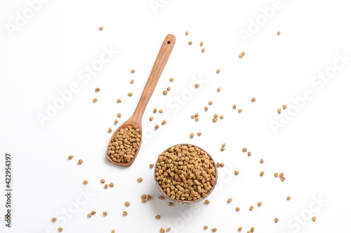 Dried chickpeas in bowl isolated on white background.