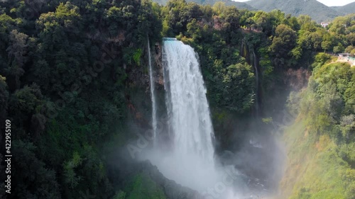 Aerial view. Water discharge, strong, maximum flow. Rainbow. The Cascata delle Marmore is a the largest man-made waterfall. Terni in Umbria Italy. Hydroelectric power plant