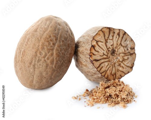 Grated nutmeg and seeds isolated on white