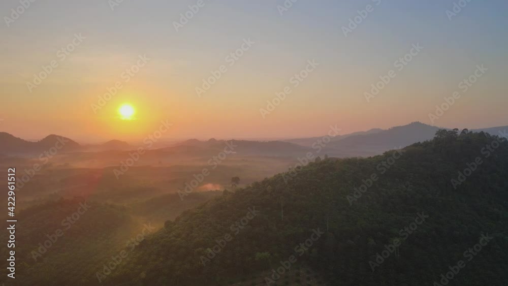 4K. Aerial view Scene of Landscape sunset or sunrise over forest landscape. Nature and travel concept. 4K. Aerial view Scene of Landscape sunset or sunrise over forest landscape. Nature and travel concept.