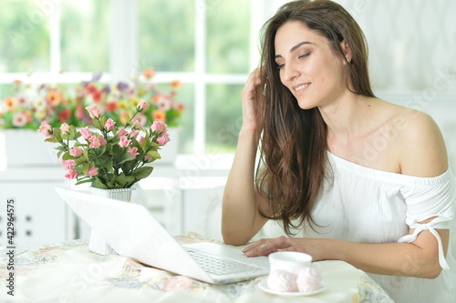 young woman with laptop