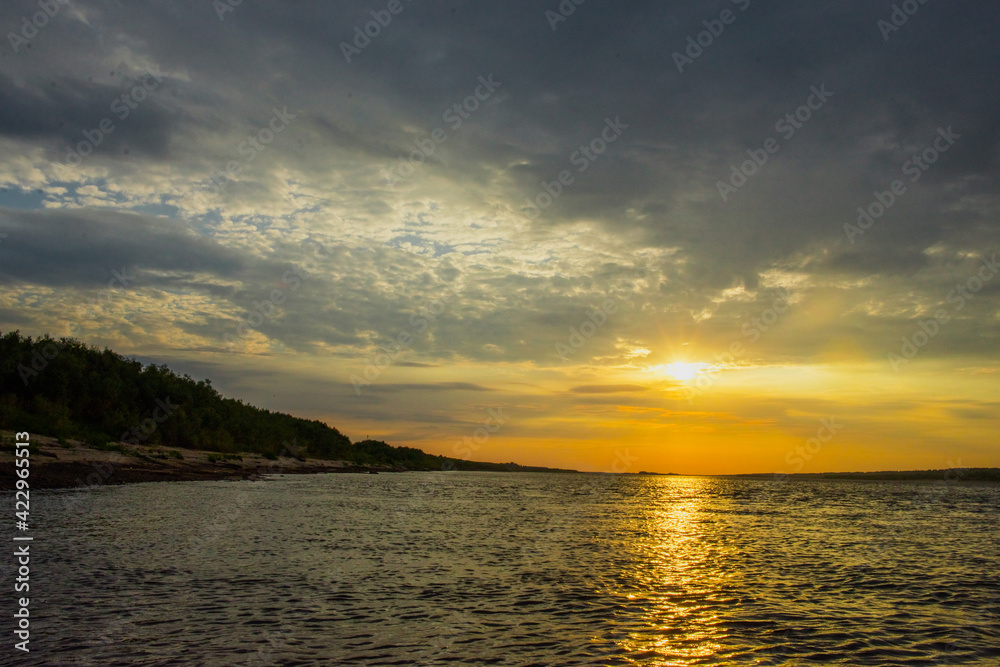 wide landscape with river bank at sunset wide landscape with river bank at sunset