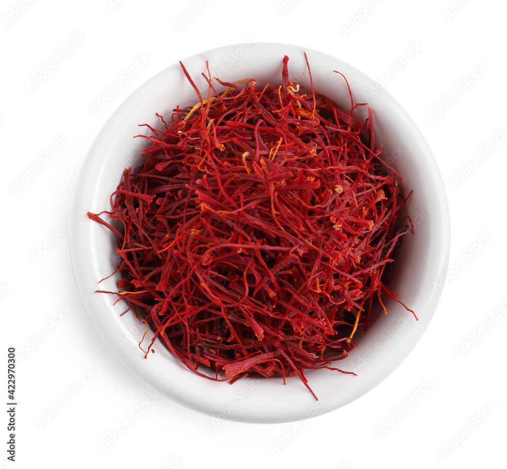 Fototapeta premium Dried saffron in bowl isolated on white, top view