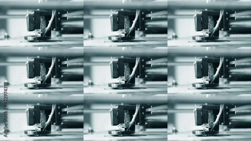 Modern 3D printer printing an object from the hot molten. Modern 3D printer printing an object from the hot molten.