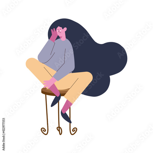 depressed woman seated