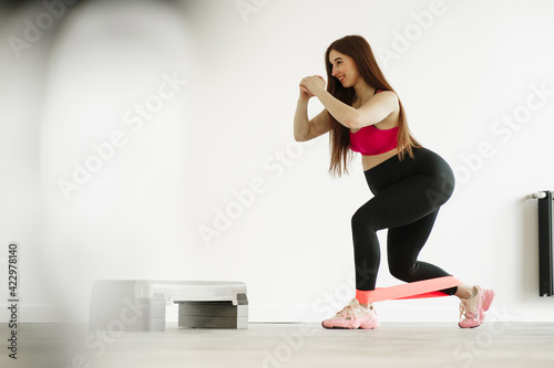 Fototapeta Naklejka Na Ścianę i Meble -  Pregnant woman doing sports in gym