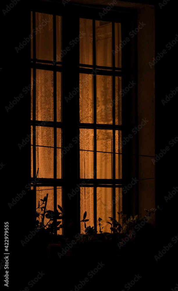 Obraz premium warm light from window at night.