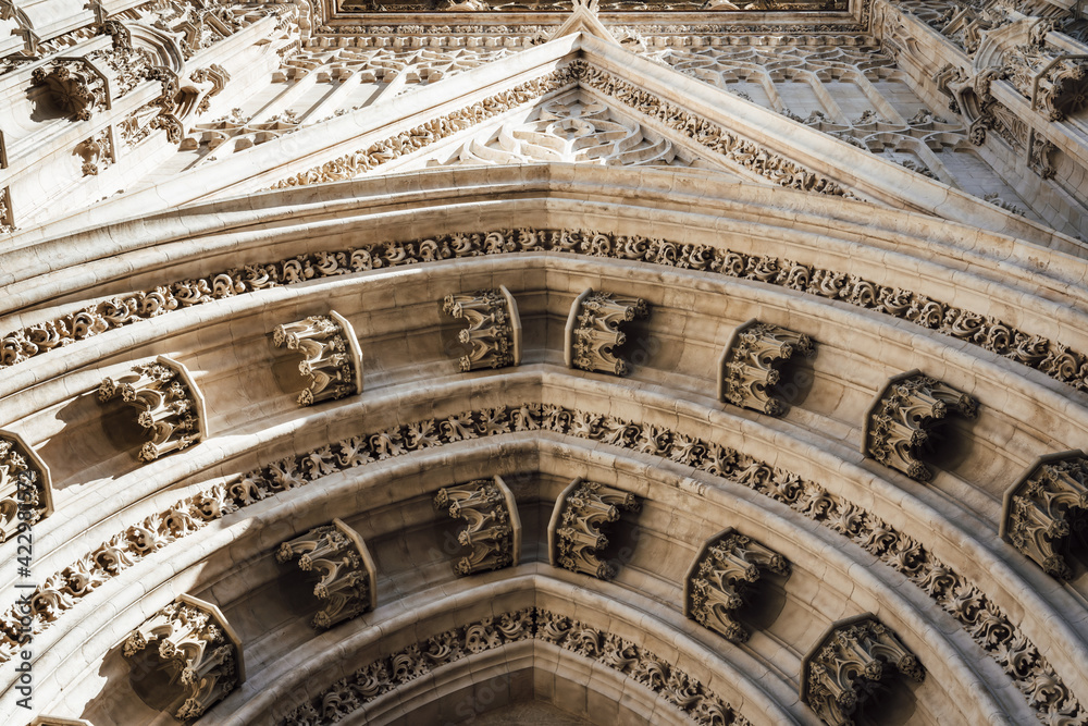 Fragment facade of Seville Cathedral. Largest Gothic church in the world. Cathedral of Saint Mary of the See, Andalusia, Spain.