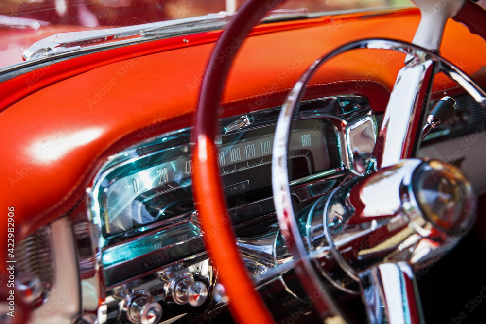 Steering Wheel and Speedometer of A Red Cadillac Eldorado Steering Wheel and Speedometer of A Red Cadillac Eldorado