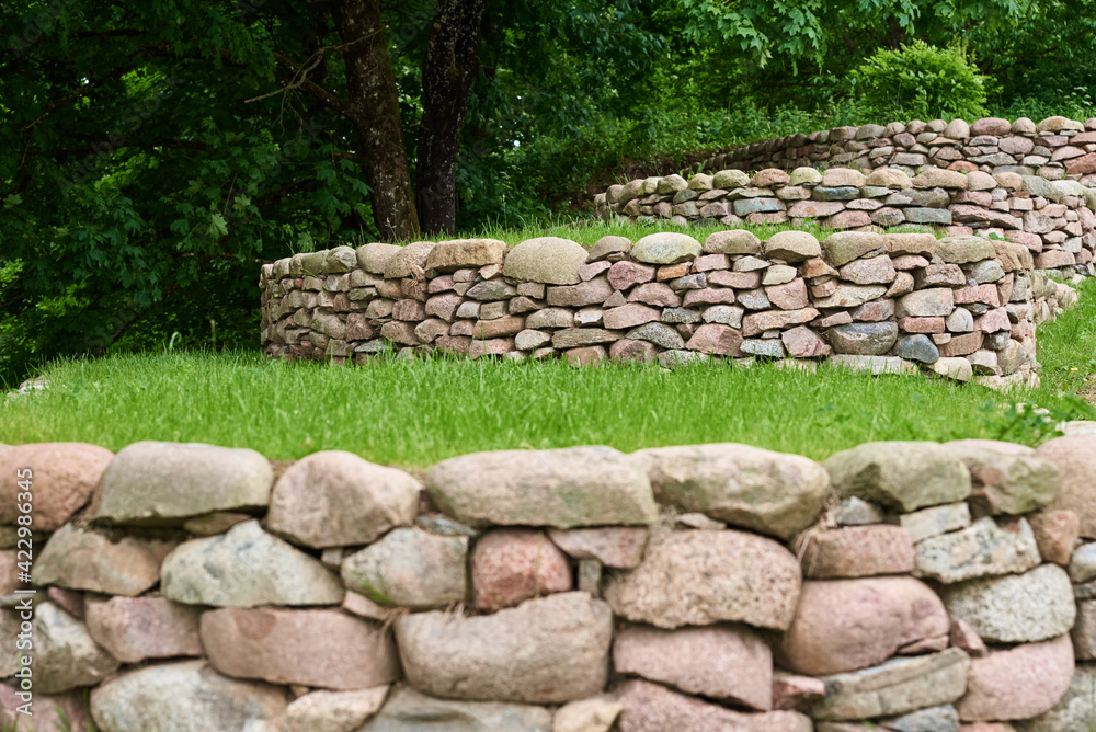 Stones and green grass, front yard. Landscape design Stones and green grass, front yard. Landscape design