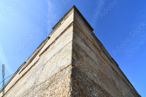 old brick wall of building, photo as a background , in a coruna north spain, galicia, spain, europe , tower of hercules lighthouse