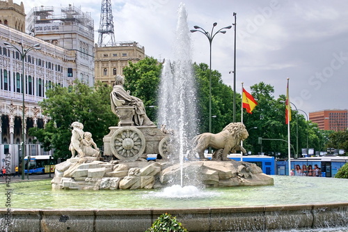 Fountain of the Goddess Cibeles (Fuente de La Diosa Cibeles) and Cibeles Center or Palace of Communication Culture and Citizenship Centre in the Cibeles Square of Madrid (Plaza Cibeles). photo