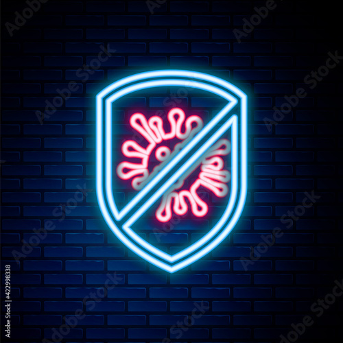 Glowing neon line Stop virus, bacteria, germs and microbe icon isolated on brick wall background. Antibacterial and antiviral defence, protection infection. Colorful outline concept. Vector