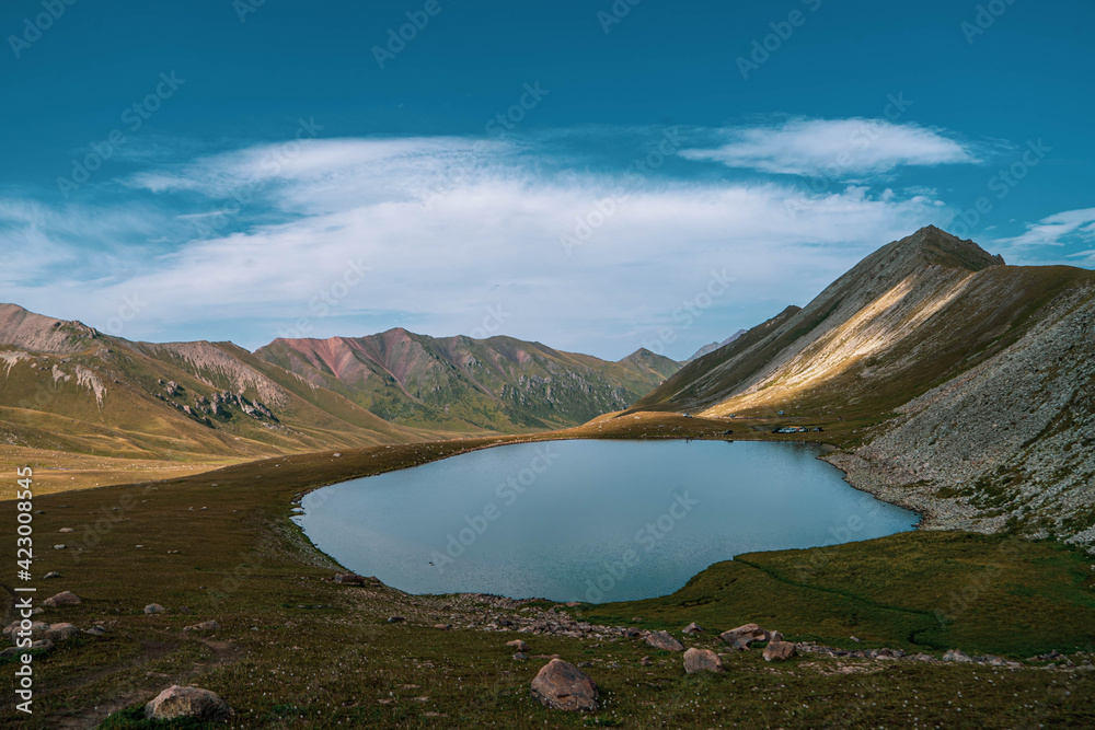 lake high in the mountains, glaciers and water in the mountains. Kazakhstan, Central Asia