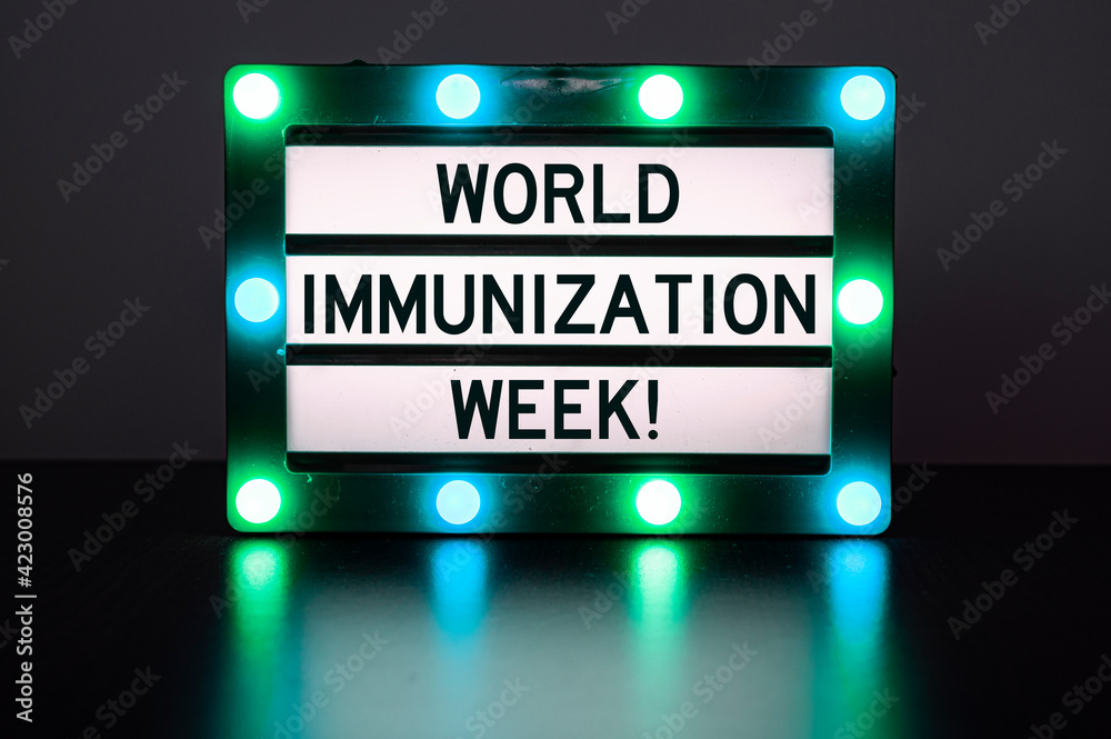 Lightbox with green lights with words - World immunization week! Lightbox with green lights with words - World immunization week!