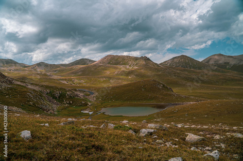 lake high in the mountains, glaciers and water in the mountains. Kazakhstan, Central Asia