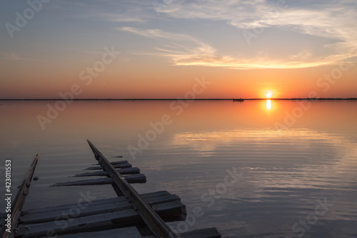 sunset lake clouds rails reflection salt horizon © Iri_sha