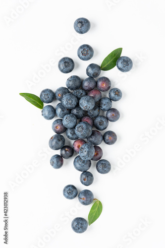 Fresh blueberries background top view. Blueberry berries with water drops.