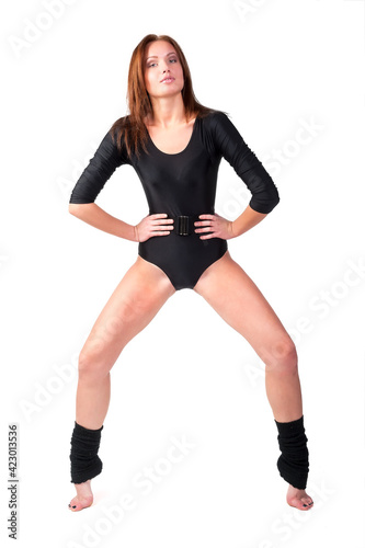 Beautiful girl in black gymnastic suit