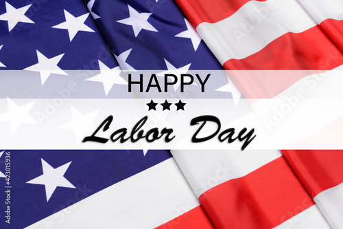 Text HAPPY LABOR DAY on USA flag