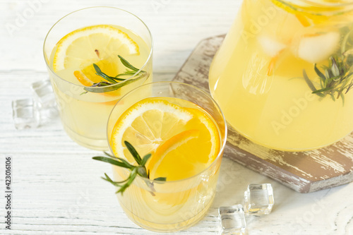 Glasses with citrus lemonade, summer soft drink, top view