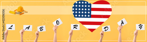 Hands of voting people with...