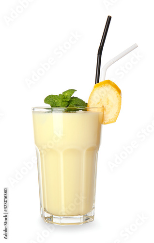 Glass of tasty banana milkshake on white background