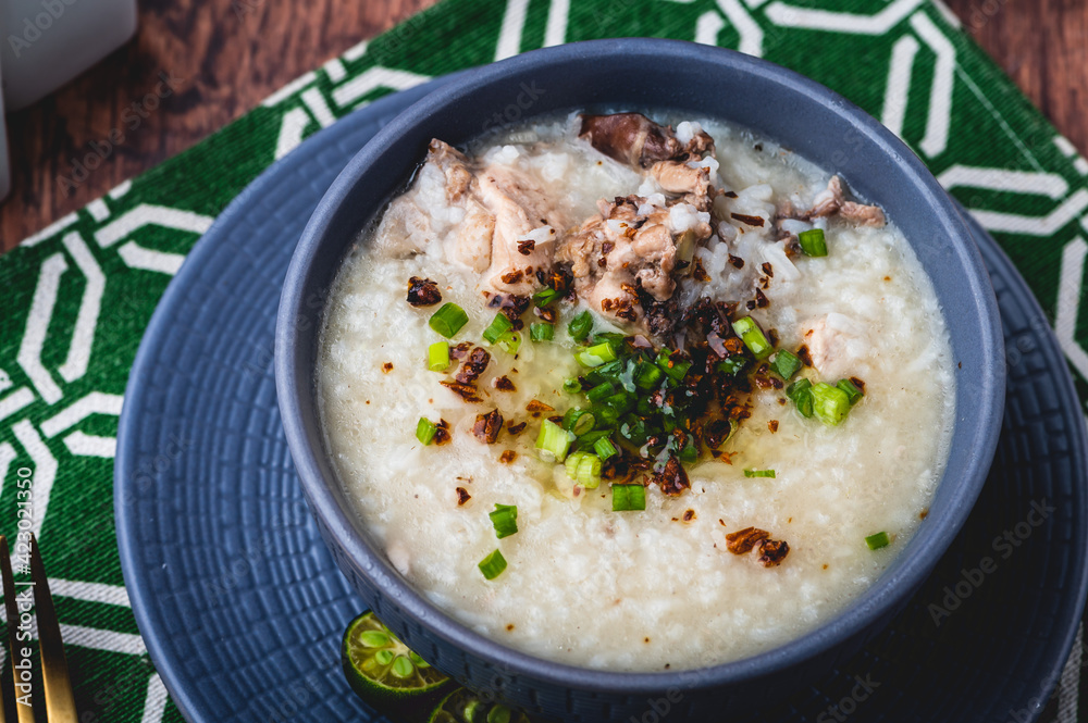 Arroz caldo, also spelled Aroskaldo (Top Shot)- is a Filipino rice and chicken gruel heavily infused with ginger and garnished with toasted garlic, scallions, and black pepper.