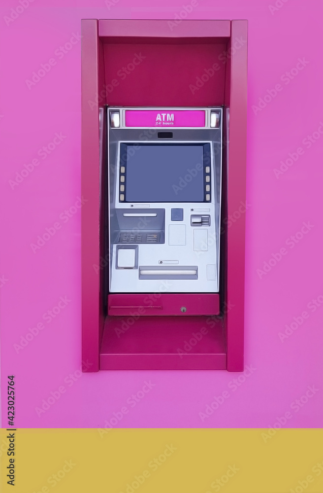 Pink cash dispenser that is not used by people Pink cash dispenser that is not used by people