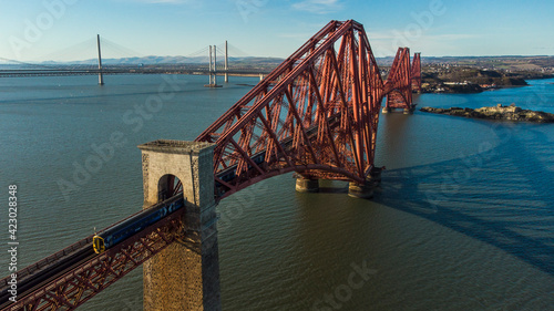 Принти на полотні A view of a train traveling over the Forth Rail Bridge in South Queensferry