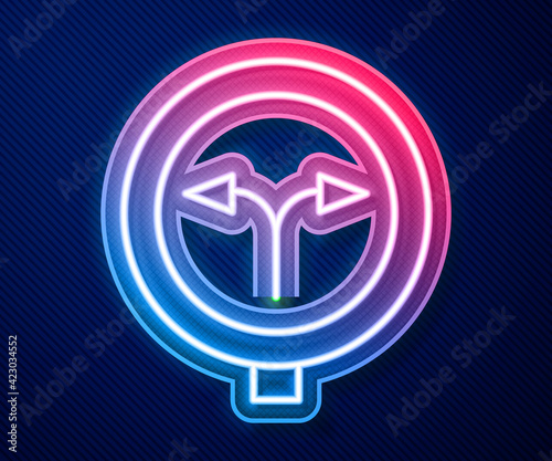 Glowing neon line Fork in the road icon isolated on blue background. Vector