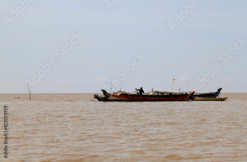 Fishing boats in Tonle Sap lake, Cambodia photo