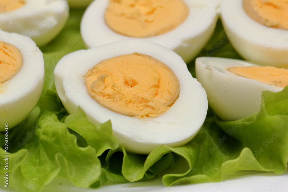boiled eggs with lettuce leaf