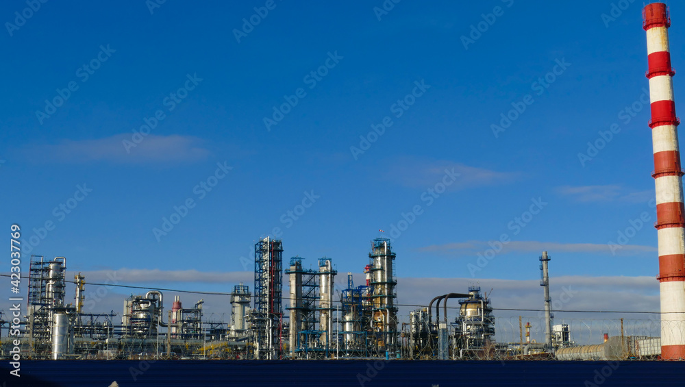 Corps of Moscow refinery in spring in clear weather Corps of Moscow refinery in spring in clear weather