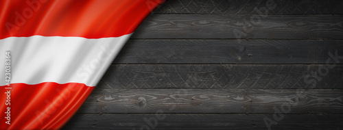 Austrian flag on black wood wall banner