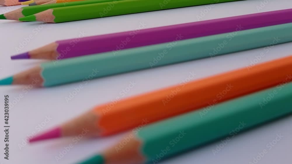 a shoot of the pencil colors on the blank paper a shoot of the pencil colors on the blank paper
