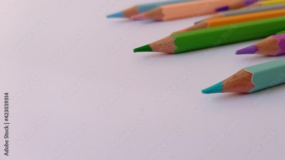 a shoot of the pencil colors on the blank paper a shoot of the pencil colors on the blank paper