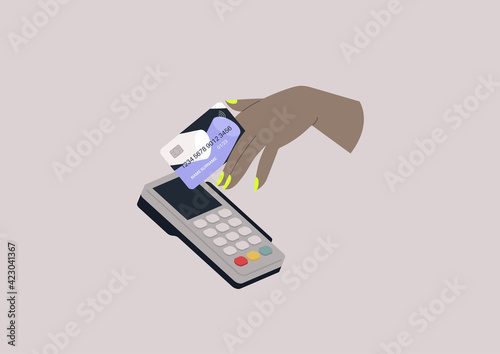 A hand paying with a credit card, wireless transactions, finance and banking, a pos machine